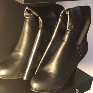 Black knee length boots